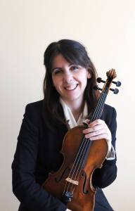 Picture of Elisa, CMA upper strings tutor, with her violin